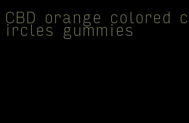CBD orange colored circles gummies
